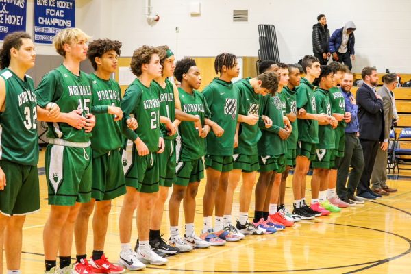 Boys basketball during the National Anthem.