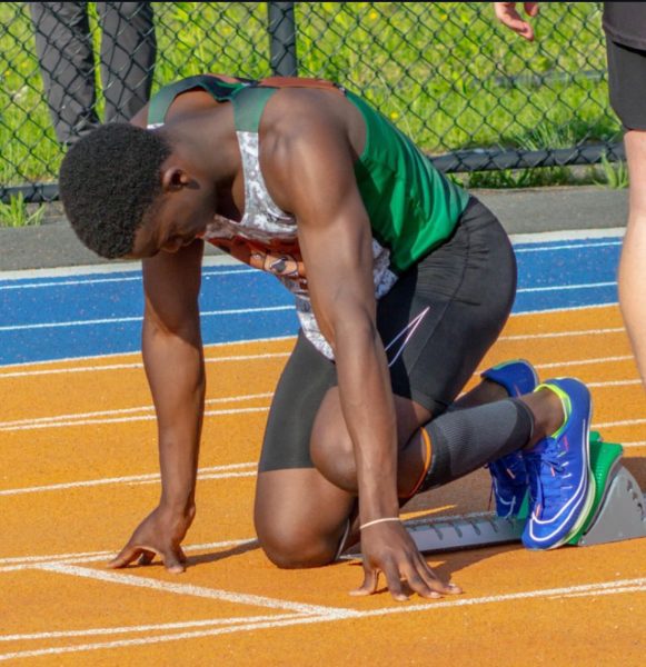 Ethan Hudson gets set and awaits the gunshot for the start of the race.