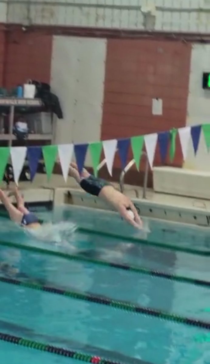 Isaac diving into the first meet of the season