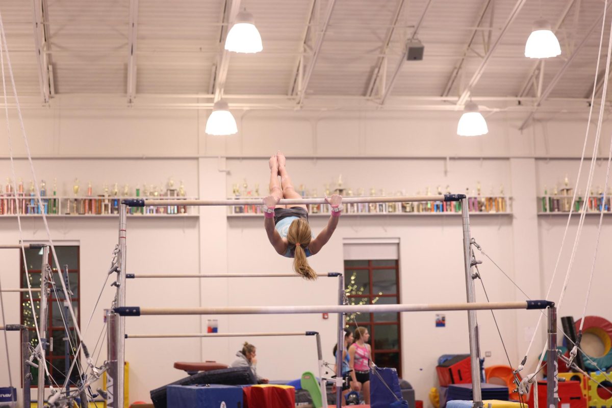 Hoffman practicing her bars routine 